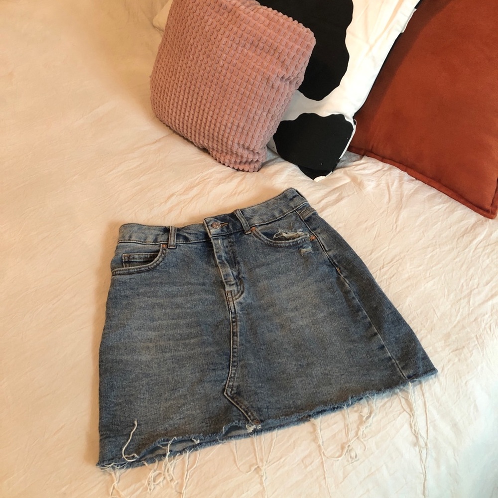 raw hem medium wash denim skirt